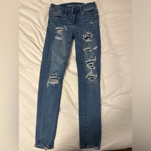 Patched holes American eagle jeans. Size 2 skinny jeans